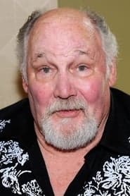 Joseph Whipp dans le rôle de Sergeant Parker