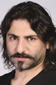 Emrah Elçiboğa في دور Necmi