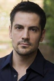 Michael Landes dans le rôle de Thomas Burke