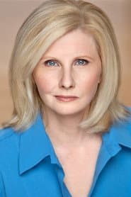 Jane Fergus dans le rôle de TV Anchor