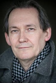 Jonathan Coote في دور Priest