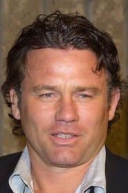 Richard Tyson dans le rôle de Mitchell Toblat / The Beast