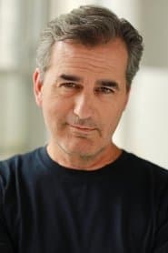 Shaun O'Hagan dans le rôle de Prosecutor Ellis