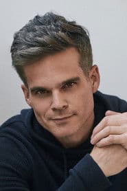 Greg Rikaart في دور Scott