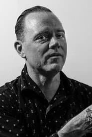 C.W. Stoneking dans le rôle de John Crops (voice)