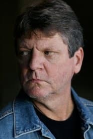 Brent Briscoe في دور Crusher