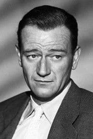 John Wayne في دور Reuben J. "Rooster" Cogburn