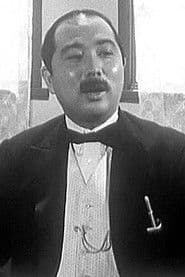 弘松三郎 dans le rôle de Takita, President of club "Gin no Kutsu"
