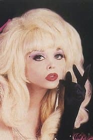 Angelyne في دور Sly Fox Dancer