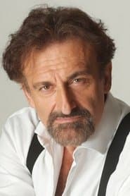 Massimo Venturiello في دور Rudy