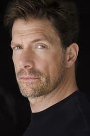 Jason Brooks في دور Lt. Commander Chase Seward