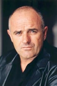 Bruce Byron في دور Police Officer