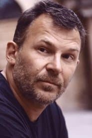 Manu Lanzi في دور Police Officer