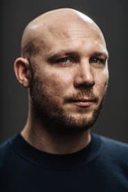Jeroen Perceval as Chaplain Janssen