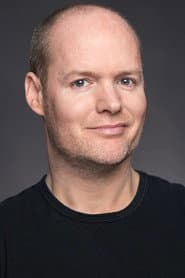 Devin Upham في دور Hotel Clerk