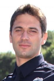 Ciprian Clipea dans le rôle de Police Officer