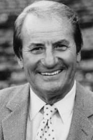 Don Gillis dans le rôle de TV game announcer