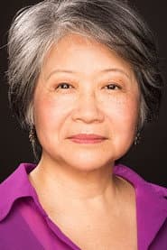 Jo Yang dans le rôle de Grocery Clerk