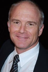 Dan Butler as Garrity