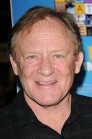 Charles Haid dans le rôle de Bishop Cahill
