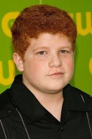 Travis T. Flory في دور Redheaded Kid