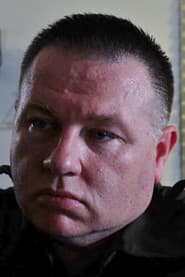 Chris Townley في دور The Deputy