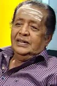 Poojappura Ravi dans le rôle de Mathachan