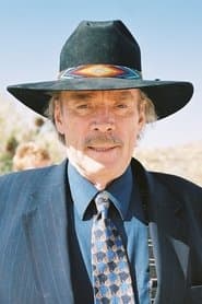 Ted Markland في دور Malcolm Price
