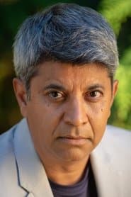 Dhirendra في دور Sharma