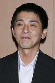 田中実 dans le rôle de Takuro Komiya