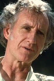 Dick Stockley في دور Times Journalist