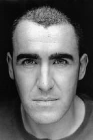 Pat Kinevane في دور Mr. McGinty / Bar Patron