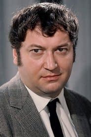 Michel de Ré dans le rôle de Fiacre, the Pharmacist