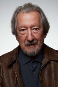 Michael Caton في دور Les