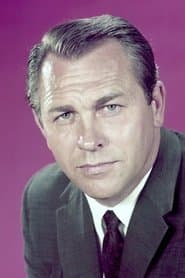 Howard Keel dans le rôle de The Poet