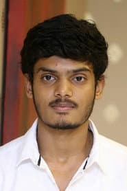 Akash Puri as Karthik Subramaniam