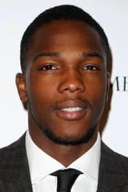 Tosin Cole dans le rôle de Tzain