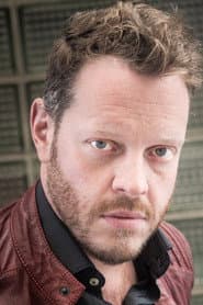 Roland Riebeling dans le rôle de Chaplain Herles
