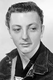 James Mitchum as Travis