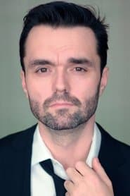 Billy MacLellan as The Reverend