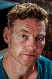Barry John Kinsella as Mark O'Shea