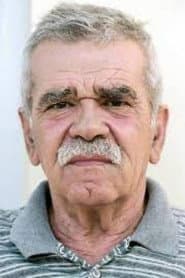 Robert Ndrenika dans le rôle de Kapteri