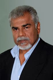 Sharat Saxena as Tiwari Seth