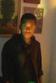 Evon JR Brockett في دور Black Male 1