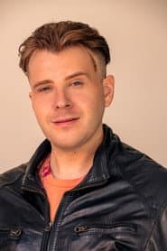 Travis John Martin as Ferry Passenger