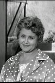 Madeleine Sylvain في دور Mrs. Clotilde Hébrard, wife of Félicien
