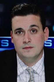 Thomas Marrone في دور Male Newscaster