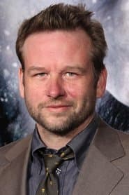 Dallas Roberts dans le rôle de David Wayne
