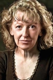 Joan Sheehy dans le rôle de Bus Passenger