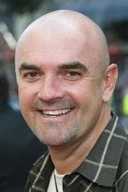 Neil Fanning في دور Scooby-Doo Voice / Tasmanian Devil (voice)